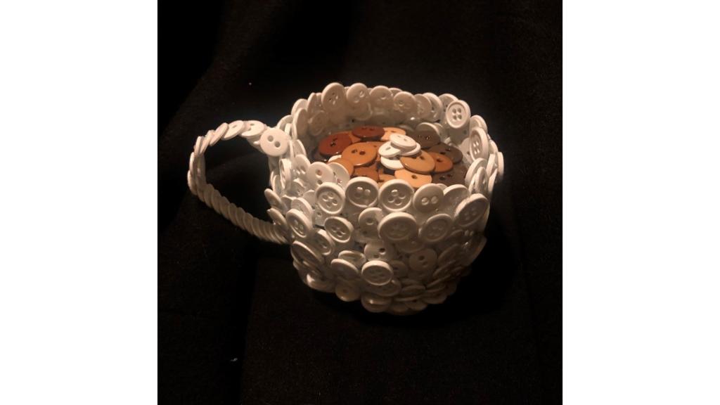 Mug made out of buttons