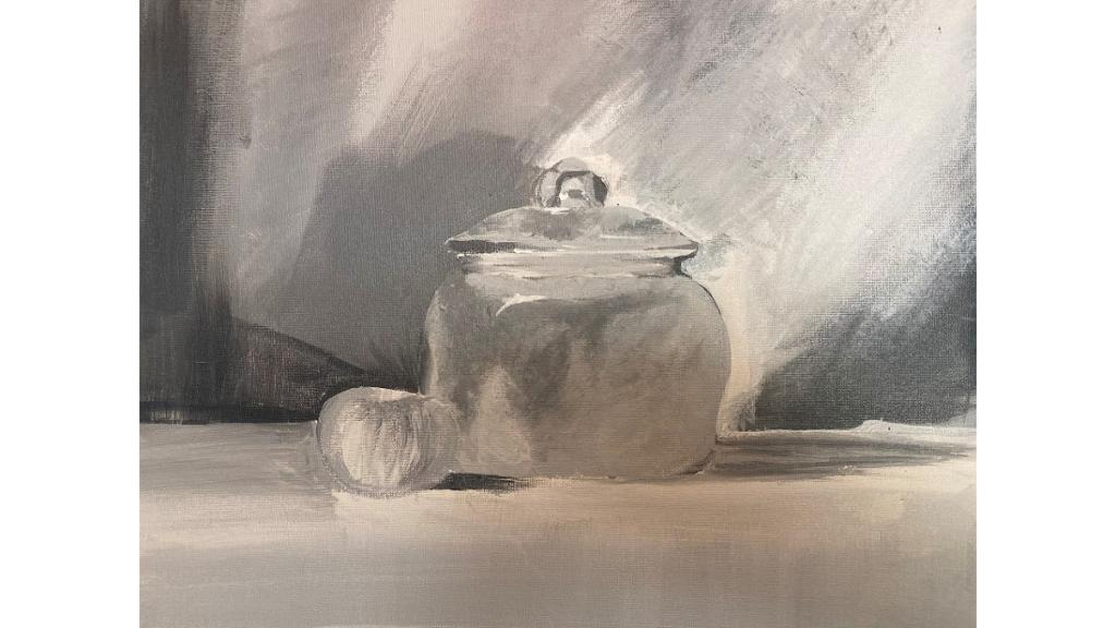 Gray scale cookie jar on table