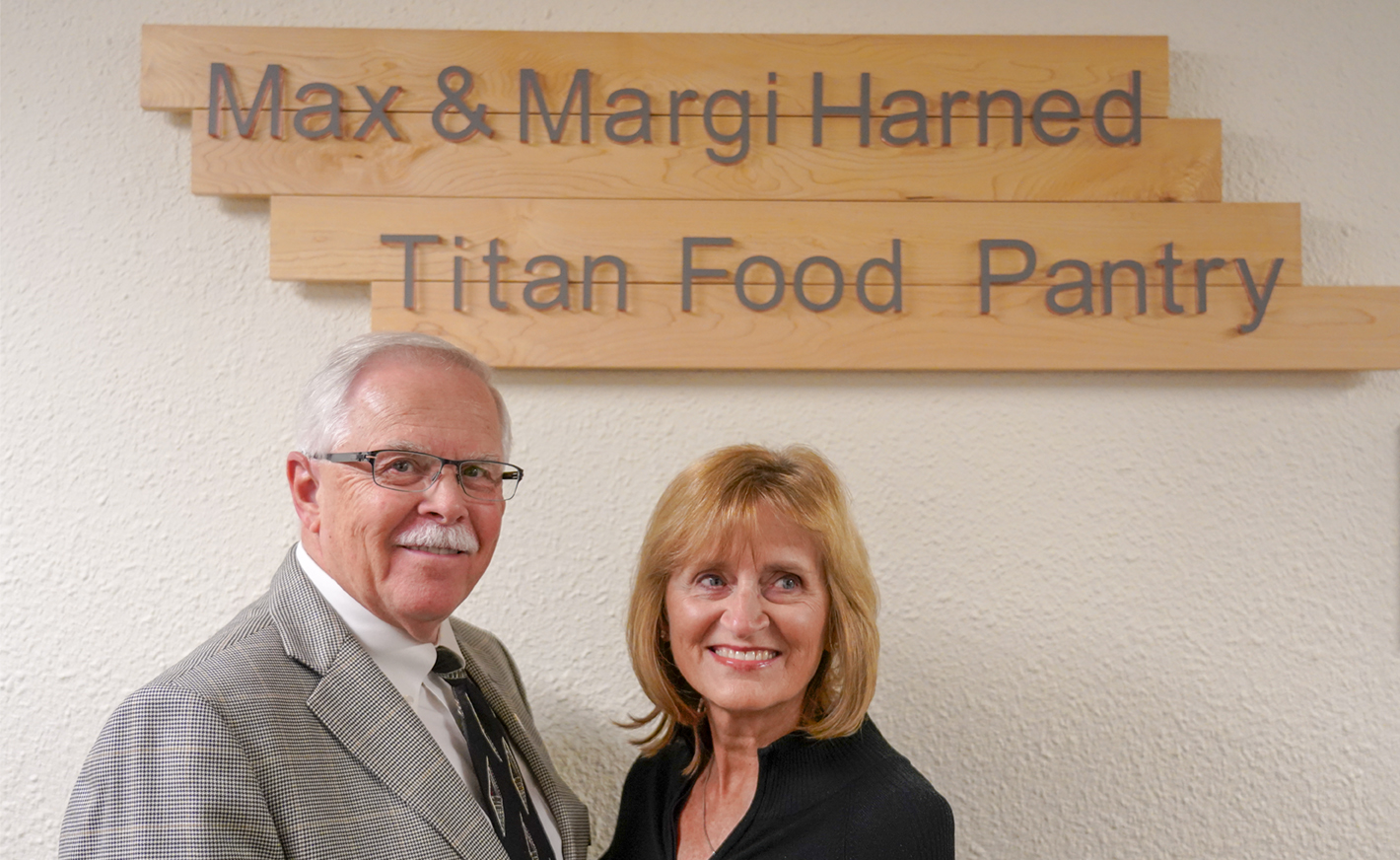 max and margi harned at the food pantry
