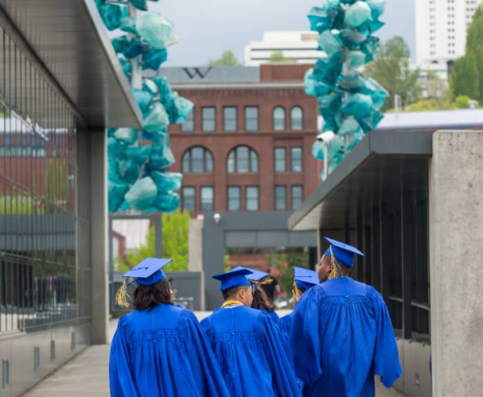 grads walk in downtown tacoma