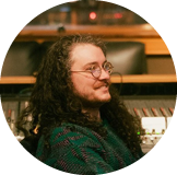 male side profile in chair