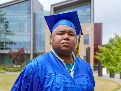 Student in graduation regalia