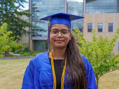 Student in graduation regalia