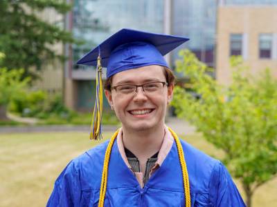 Student in graduation regalia