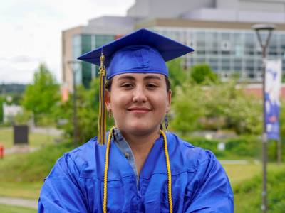 Student in graduation regalia