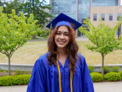 Student in graduation regalia