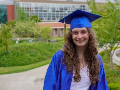 Student in graduation regalia