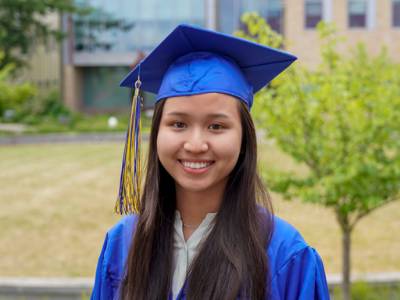 Student in graduation regalia