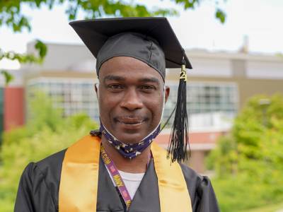 Student in graduation regalia