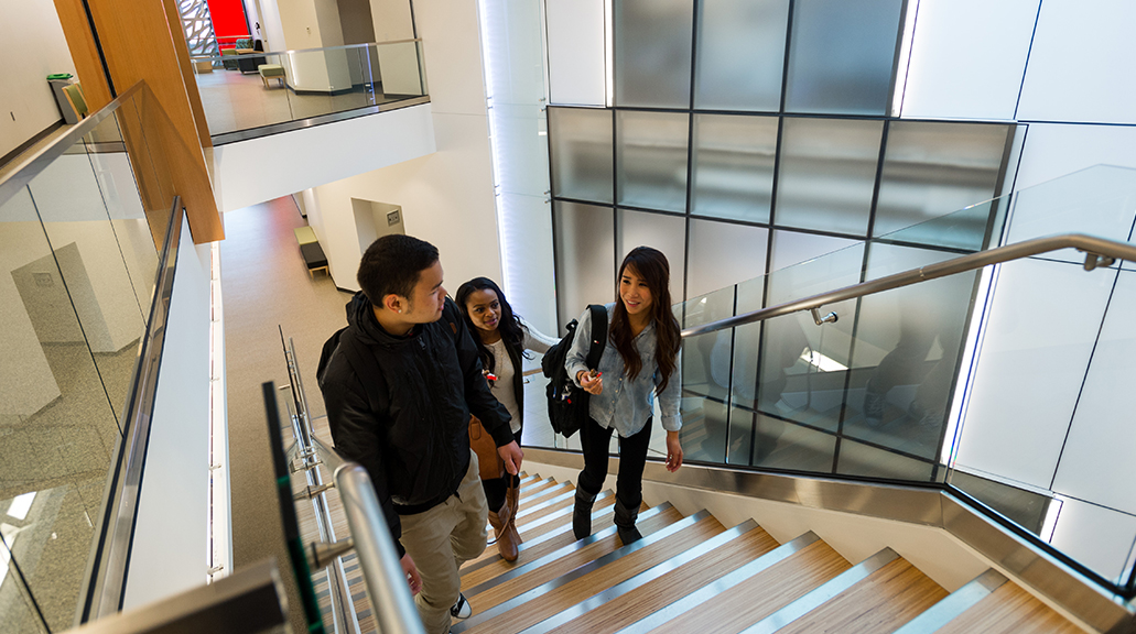 An image of students walking through TCC's Harned Center, the healthcare building on campus