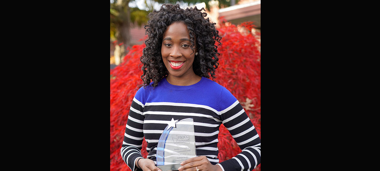 Latoya Reid Wins Faculty Excellence Award at Faculty & Staff of Color Conference