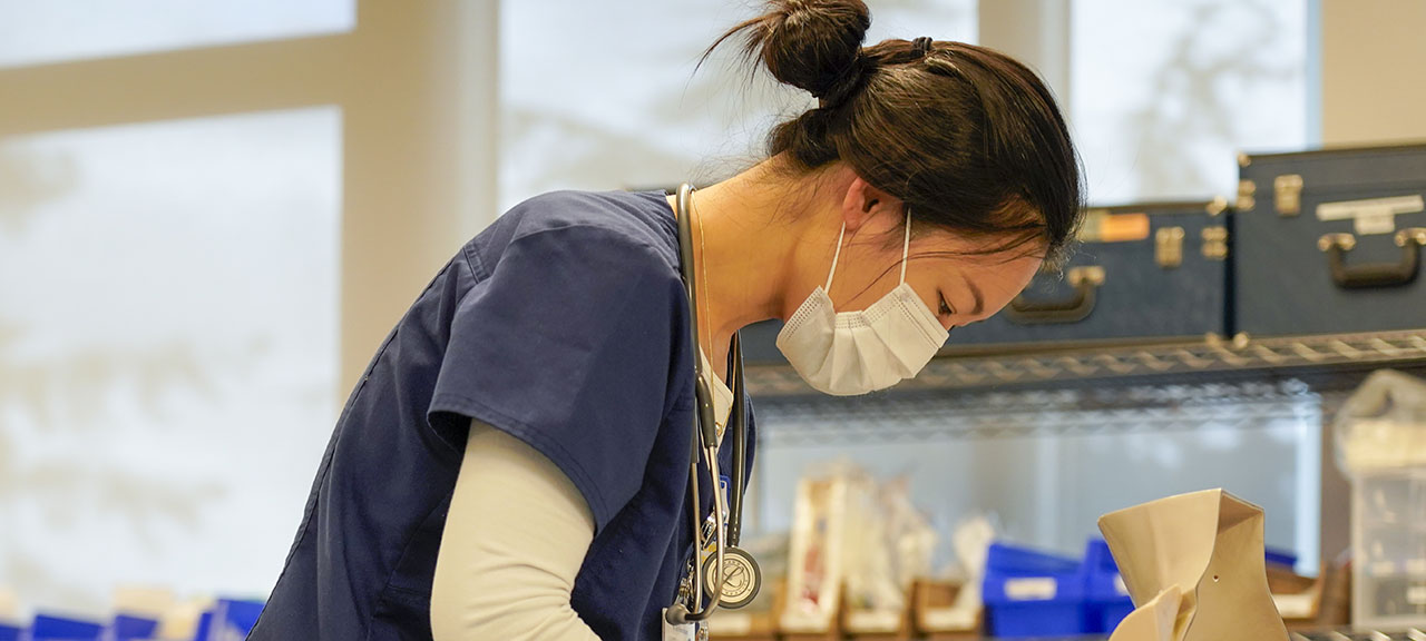 woman health careers student in mask 