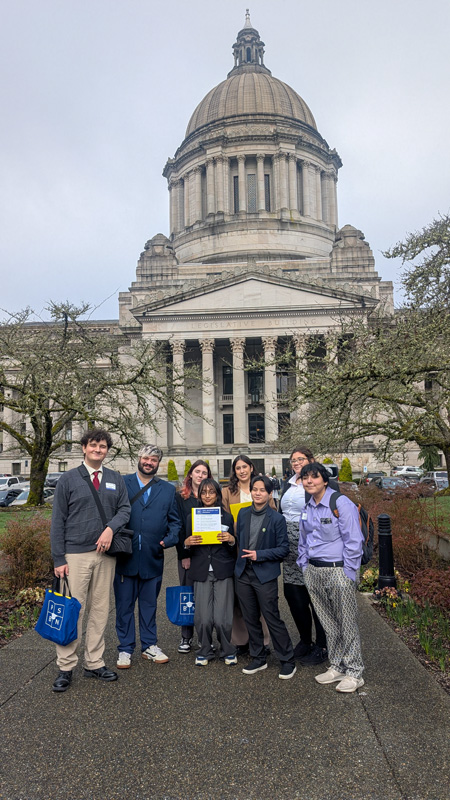 Students in front of the Washington State Capitol Building. 