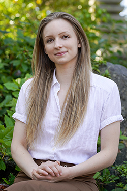 woman in a white shirt smiling